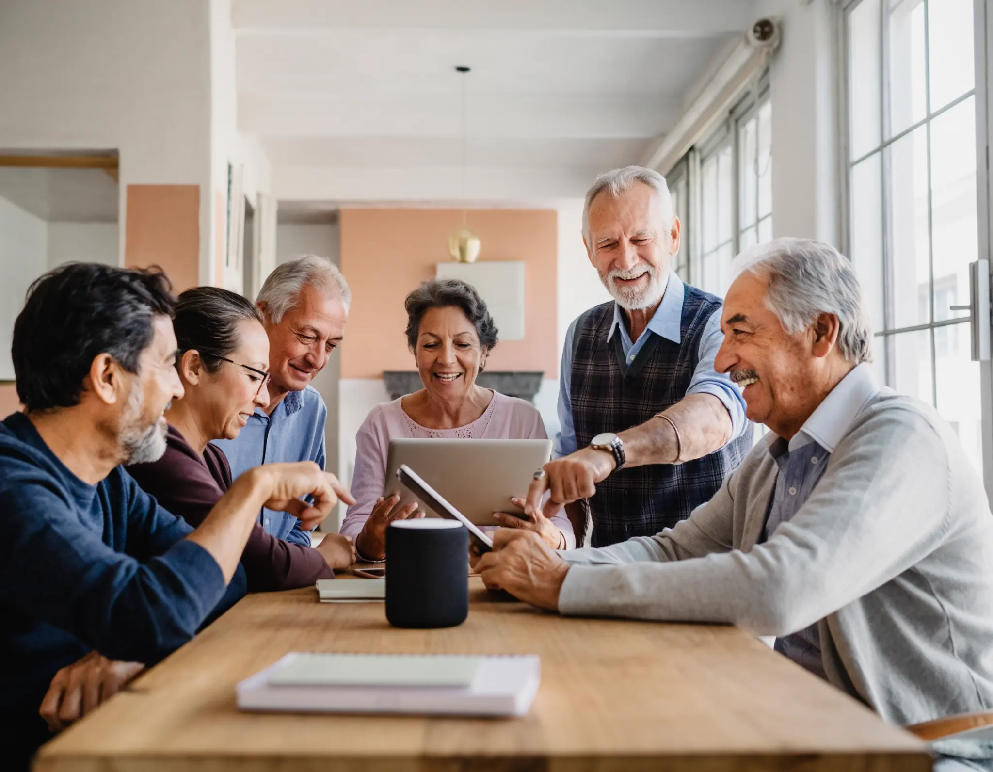 Persone di diverse età che si tengono per mano in un'atmosfera calda e accogliente, rappresentando comunità e relazioni intergenerazionali